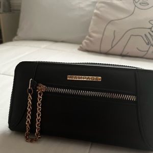 black clutch with gold chain